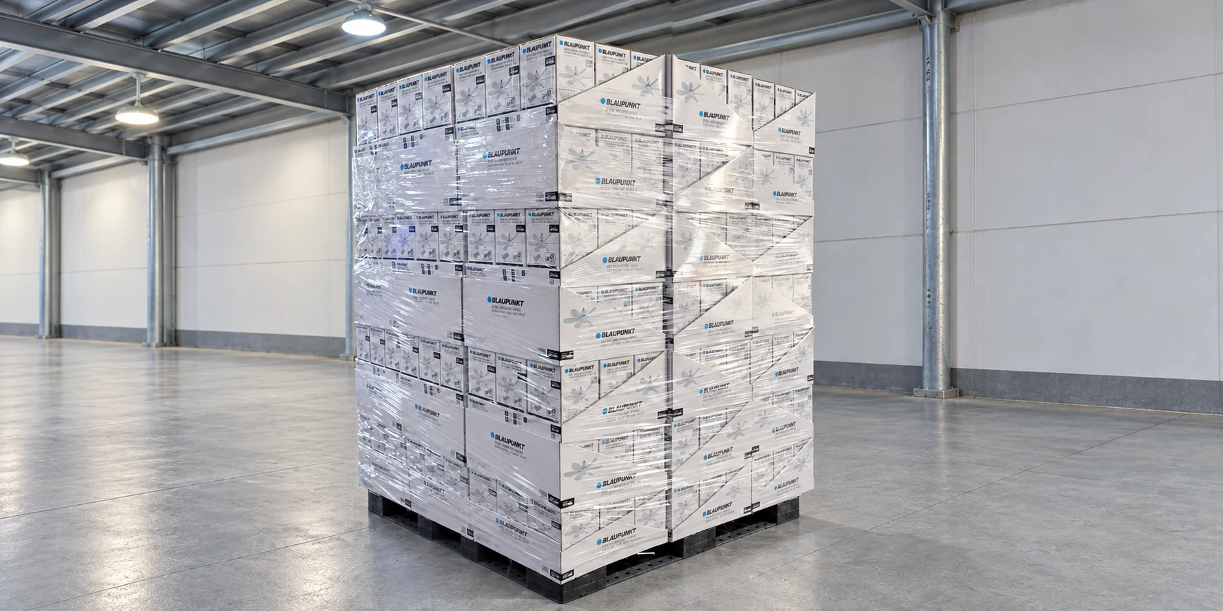 Stacked fan-light cartons secured with clear shrink wrap on a pallet